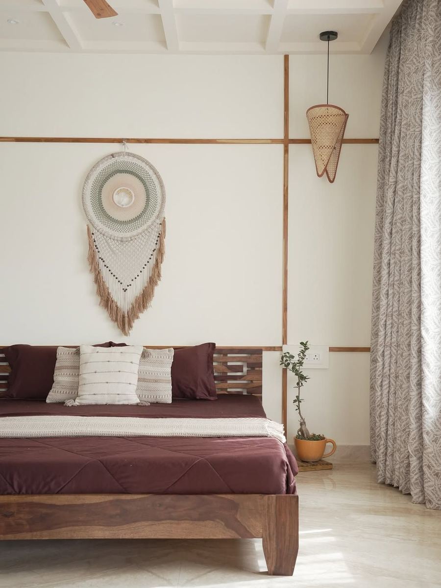 Bedroom with dream catcher and wooden bed