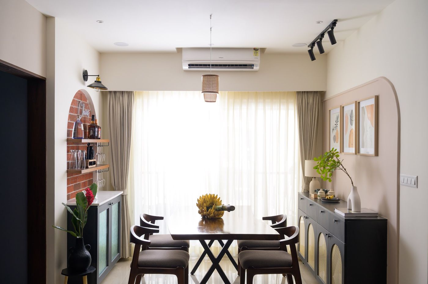Dining area with arched brick niche